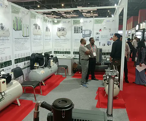 Frank Air Compressor Product Display - visitors viewing compressors at exhibition booth
